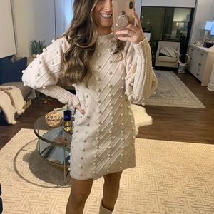 Sweater dress with Pom Poms